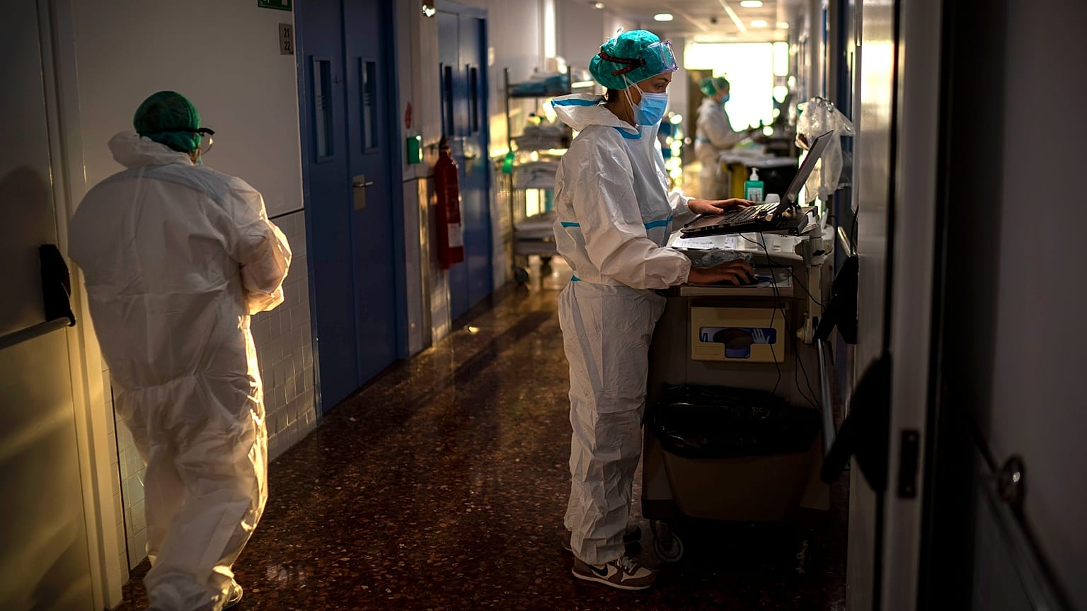 Nurse Marta Fernandez works at the COVID-19 ward at the hospital del Mar in Barcelona, Spain, Wednesday, November 18, 2020.