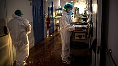 Nurse Marta Fernandez works at the COVID-19 ward at the hospital del Mar in Barcelona, Spain, Wednesday, November 18, 2020.