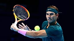 Rafael Nadal of Spain returns the ball to Stefanos Tsitsipas of Greece during their tennis match at the ATP World Finals.