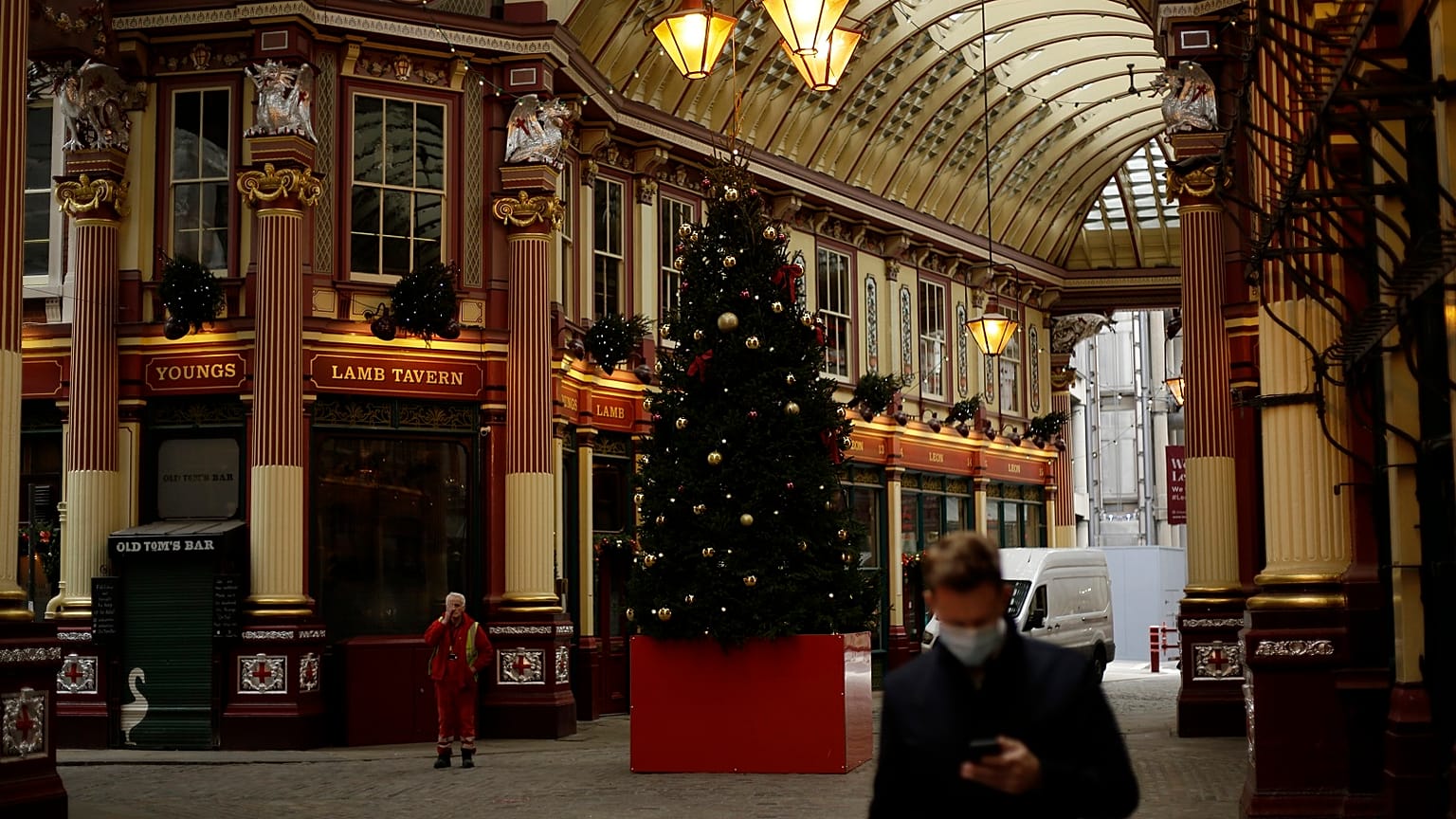 A Christmas tree stands on display in the middle of Leadenhall Market where all the non-essential shops are temporarily closed, during England's second coronavirus lockdown.