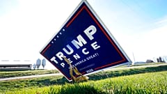 A sign in support of President Donald Trump is seen in the yard of Jasper County Republican Party chairman Thad Nearmyer, Thursday, Nov. 19, 2020, near Monroe, Iowa.
