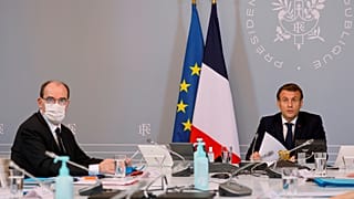 President Emmanuel Macron, right, speaks next to French Prime Minister Jean Castex, left, during a videoconference in Paris, November 17, 2020.