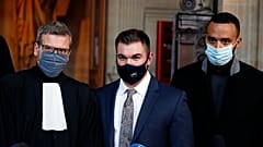 Alek Skarlatos, center, Anthony Sadler, right, and their lawyer Thibault de Montbrial at the Paris courthouse, Friday, Nov. 20, 2020.