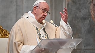 Pope Francis delivers his speech as he celebrates Mass on the occasion of the Christ the King festivity, in St. Peter's Basilica at the Vatican, Sunday, Nov. 22, 2020.