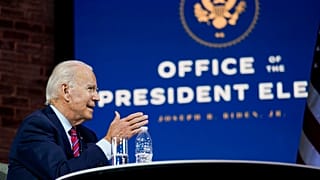 President-elect Joe Biden speaks during a meeting at The Queen theatre Monday, Nov. 23, 2020, in Wilmington, Del. (AP Photo/Carolyn Kaster)