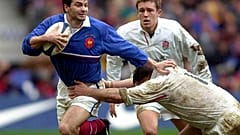 Le rugbyman français Christophe Dominici (à gauche) lors d'un match France-Angleterre le 19 février 2000 - photo d'archives