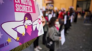 Women take part in a demonstration on the International Day for the Elimination of Violence against Women, in Rome, Wednesday, Nov. 25, 2020.