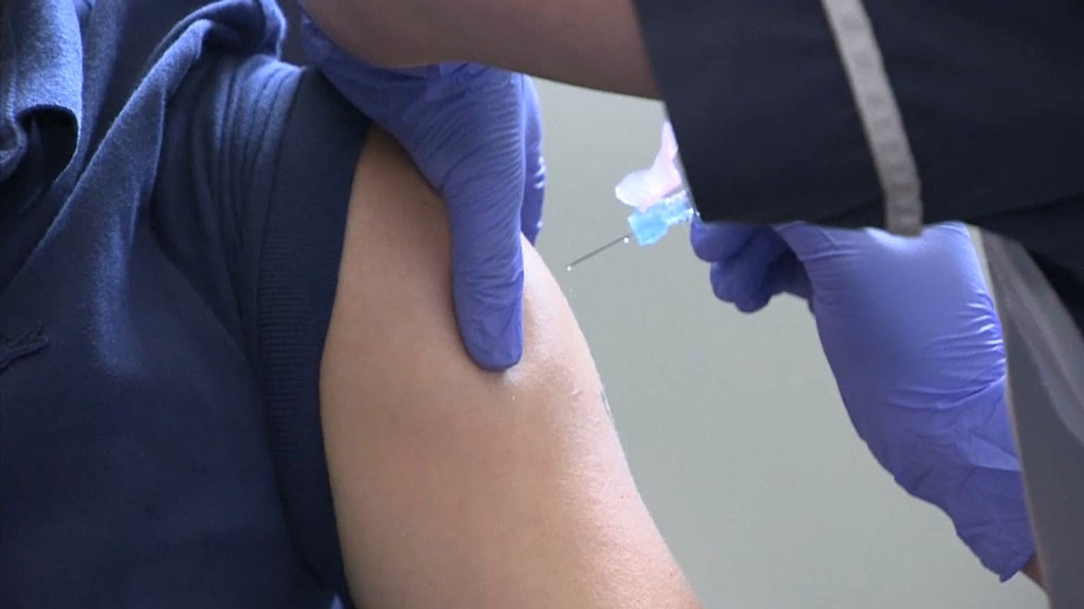 Volunteer receiving COVID-19 experimental vaccine 