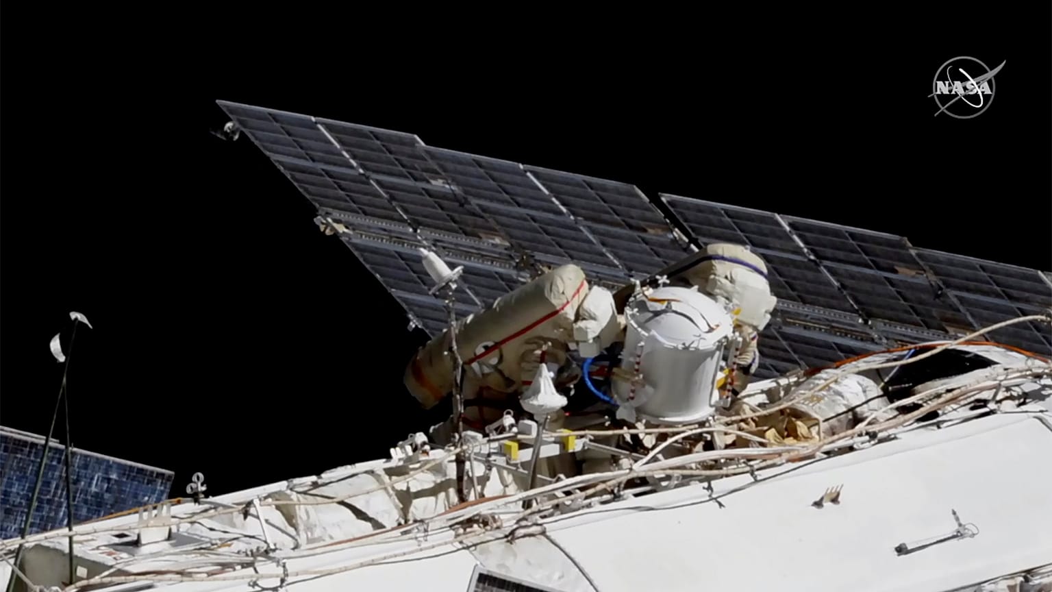 This photo provided by NASA shows Russian astronauts Sergey Ryzhikov, left and Sergey Kud-Sverchkov on a spacewalk outside of the ISS on Nov. 18, 2020