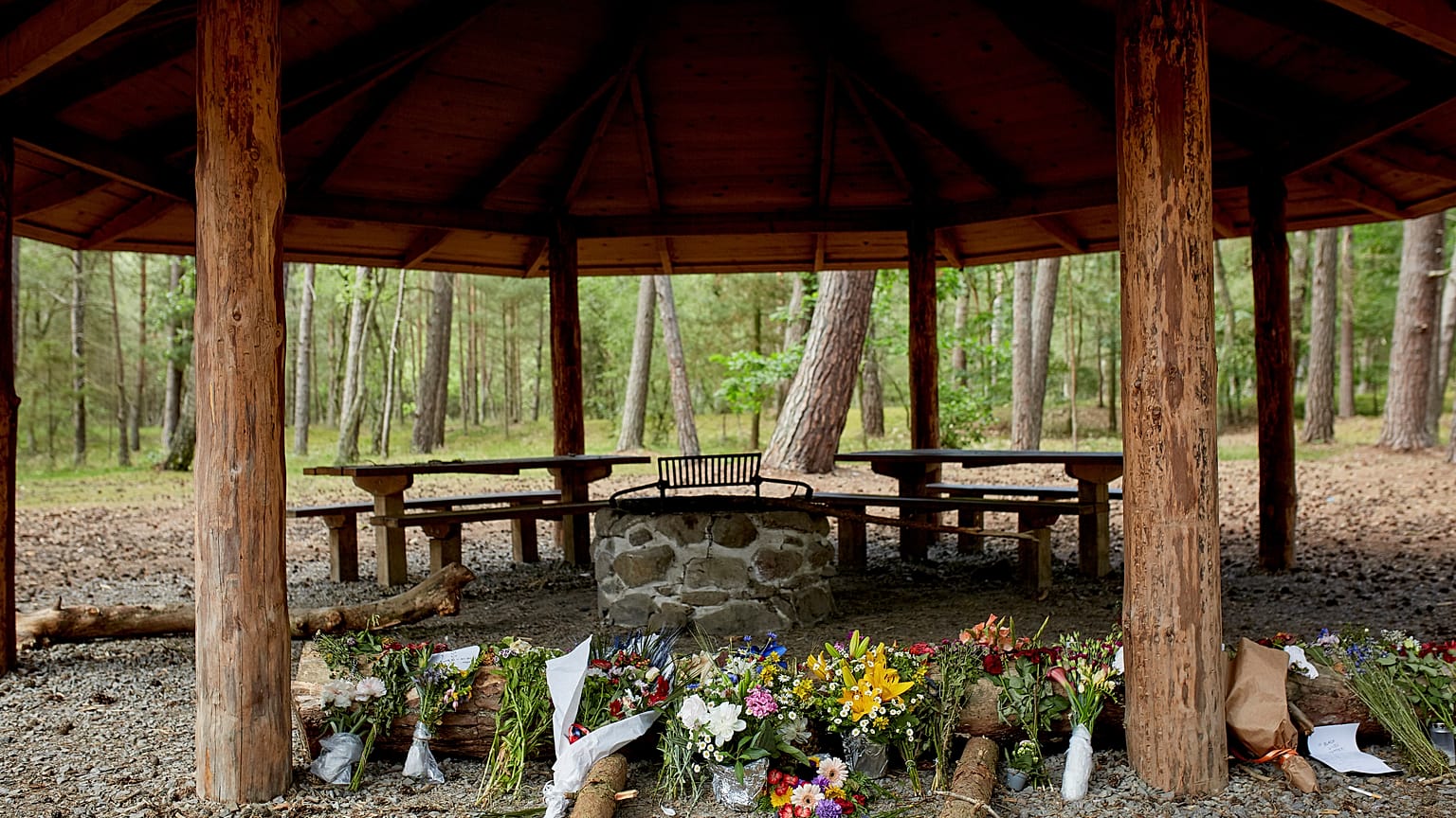 Flowers were left at the shelter where Phillip Mbuji Johansen was found on June 23 on the Danish island of Bornholm.