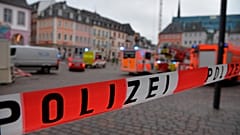 A square is blocked by the police in Trier, Germany, Tuesday, Dec. 1, 2020.
