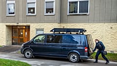 Police at the scene of an apartment where a woman is suspected of locking up her son, in Haninge