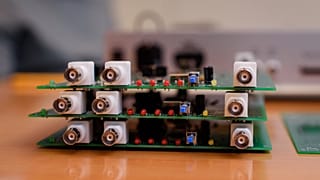 Parts for an EventTimer made by Latvian company EvenTech, which has a contract with the European Space Agency (ESA), are pictured on November 27, 2020.