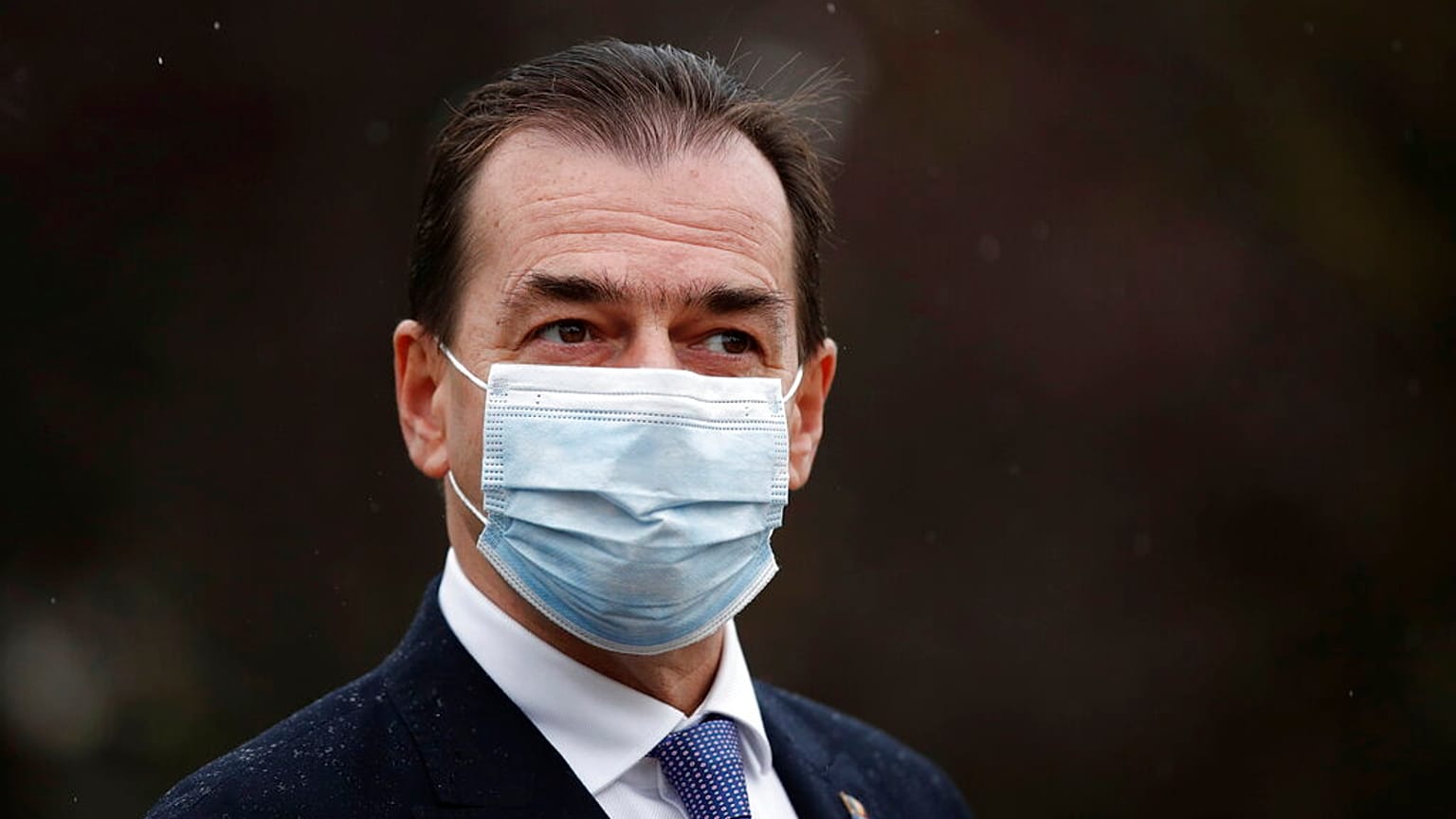 Romanian Prime Minister Ludovic Orban, walks on the Promenade Marie de Roumanie in Paris, Tuesday, Oct. 27, 2020. 