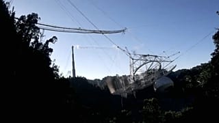 This photo is from video provided by the US National Science Foundation of the radio telescope in Arecibo, Puerto Rico, Tuesday, Dec. 1, 2020.