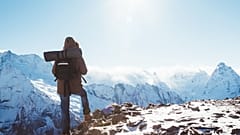 Hiker in Mountains in Winter
