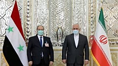 وزير الخارجية محمد جواد ظريف ونظيره السوري فيصل مقداد