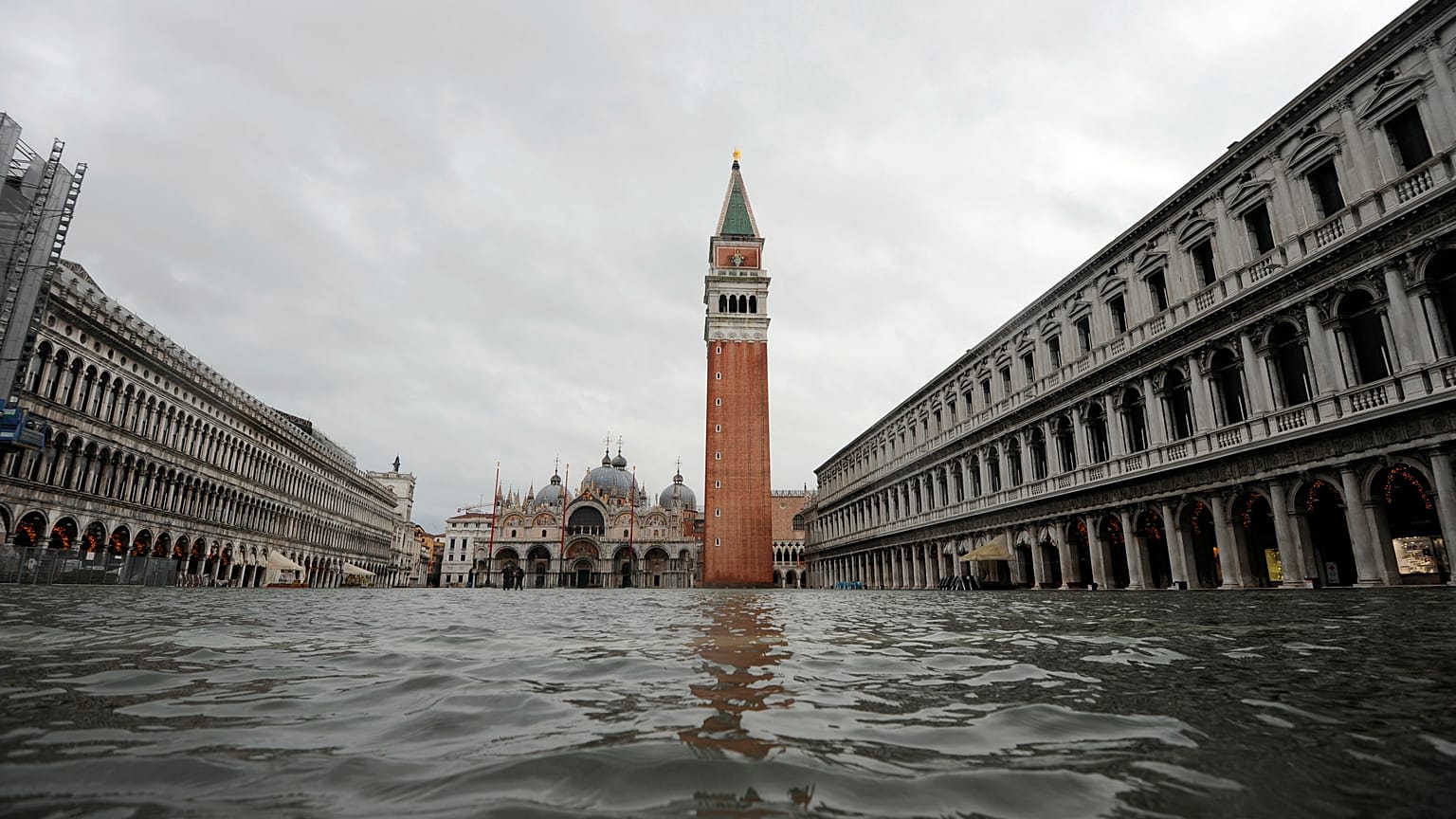 St.Mark’s square stands flooded two months after flood barriers were introduced, but failed to work. Venice, Italy. December 8, 2020