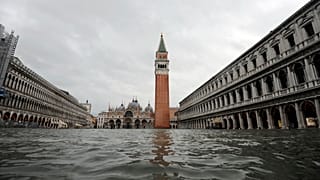 St.Mark’s square stands flooded two months after flood barriers were introduced, but failed to work. Venice, Italy. December 8, 2020