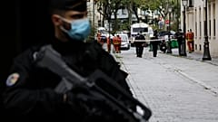 A French gendarme guards a street after a knife attack near the former offices of satirical newspaper Charlie Hebdo, Friday Sept. 25, 2020 in Paris. 