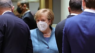 German Chancellor Angela Merkel, center, arrives for a round table meeting at an EU summit at the European Council building in Brussels, Thursday, Dec. 10, 2020. 