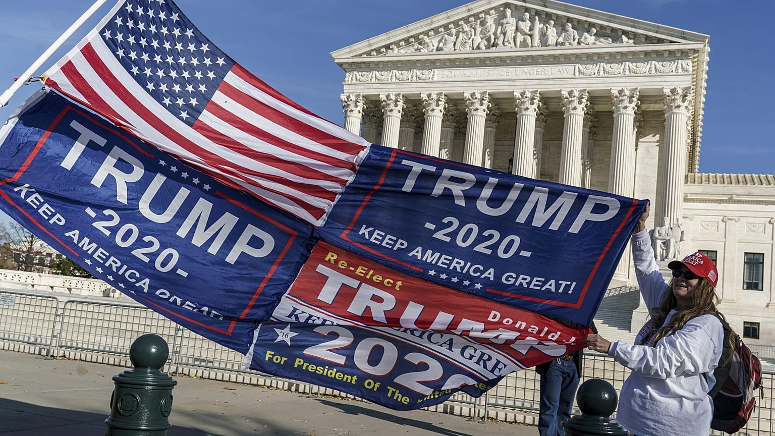 Protesters demonstrate their support for President Donald Trump at the Supreme Court in Washington, Friday, Dec. 11, 2020.