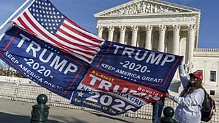 Protesters demonstrate their support for President Donald Trump at the Supreme Court in Washington, Friday, Dec. 11, 2020.