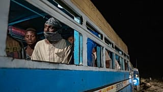 Tigrinyan refugees, who fled Ethiopia's conflict, arrive in convoys from Village 8 near the Lugdi border crossing, at Umm Rakouba refugee camp in Qadarif, eastern Sudan.