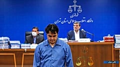 روح الله زم در دادگاه به ریاست قاضی صلوانی