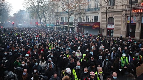 Protesters match against a protest against a proposed security bill in Paris