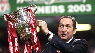 Gerard Houllier celebrates victory for Liverpool over Manchester United in the Worthington (League) Cup Final, March 2, 2003.