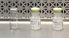 file photo shows vials used by pharmacists to prepare syringes 