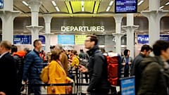Passengers wait to board the international high-speed Eurostar train to Paris at St Pancras International railway station in London, on February 1, 2020. 