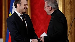 Former Vatican ambassador in France Mgr Luigi Ventura with French President Emmanuel Macron