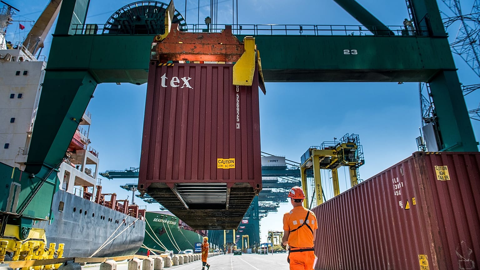 Containers being offloaded at the Port of Antwerp, Belgium.