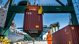 Containers being offloaded at the Port of Antwerp, Belgium.