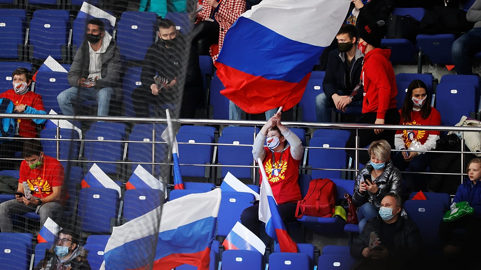 Russian spectators support their team during the Channel One Cup ice hockey match between Sweden and Russia in Moscow, Russia, Thursday, Dec. 17, 2020.