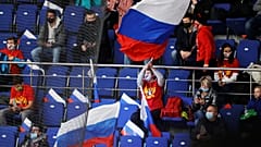 Russian spectators support their team during the Channel One Cup ice hockey match between Sweden and Russia in Moscow, Russia, Thursday, Dec. 17, 2020.