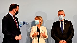  Slovenia's Tomaz Gantar, right, before a joint video conference with EU health ministers in Berlin, Germany, Thursday, July 16, 2020.