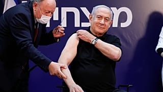 Israeli Prime Minister Minister Benjamin Netanyahu receives a coronavirus vaccine at Sheba Medical Center in Ramat Gan, Israel on Saturday, Dec. 19, 2020