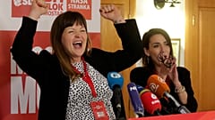 Irma Baralija greets supporters in her headquarters after local election in Mostar, Bosnia, Sunday, Dec. 20, 2020.