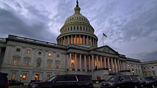 Dusk falls over the Capitol, Monday, Dec. 21, 2020, in Washington. Congressional leaders have hashed out a massive, year-end catchall bill on Monday, Dec. 22, 2020.
