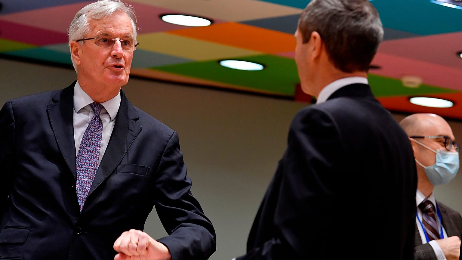 European Union's chief Brexit negotiator Michel Barnier, left, speaks with Ambassador Michael Clauss, Permanent Representative of Germany to the European Union, during a meeti