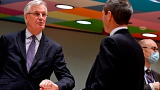European Union's chief Brexit negotiator Michel Barnier, left, speaks with Ambassador Michael Clauss, Permanent Representative of Germany to the European Union, during a meeti