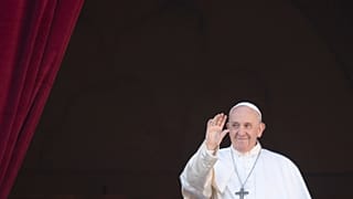 FILE - Pope Francis waves to faithful and pilgrims after he delivered the Urbi et Orbi Christmas' day blessing at the Vatican, Wednesday, Dec. 25, 2019. 