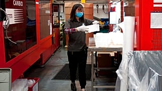 In this photo taken on Monday, Feb. 18, 2019, staff work at GoodFish, an injection molding business that supplies the auto industry, at their factory in Cannock, England. 