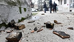Residents in Sisak inspect damage caused by the earthquake.
