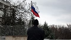 A Bulgarian police officer stands in front of Russian embassy in Sofia.
