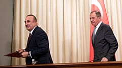 Turkish Foreign Minister Mevlut Cavusoglu, left, and Russian Foreign Minister Sergey Lavrov
