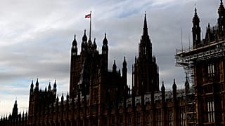 A Union Jack flag flies on top of Parliament during the debate in the House of Commons on the EU (Future Relationship) Bill in London, Wednesday, Dec. 30, 2020.